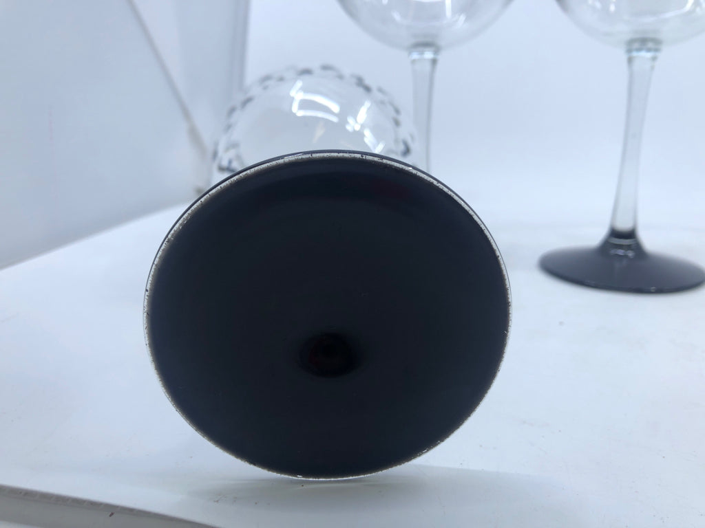 4 LARGE MICKEY MOUSE WINE GLASSES.