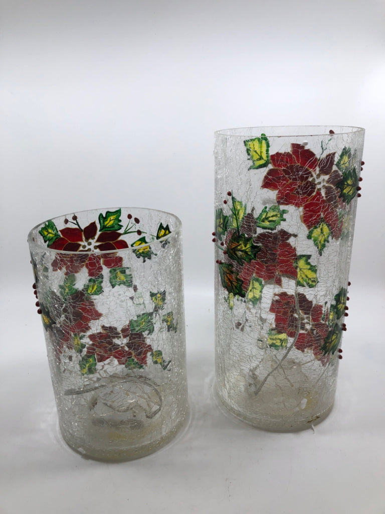 2 LED POINSETTIA HURRICANE LIGHTS IN BOX.