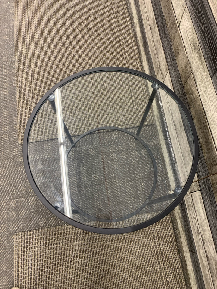 ROUND BLACK METAL SIDE TABLE W/GLASS TOP.