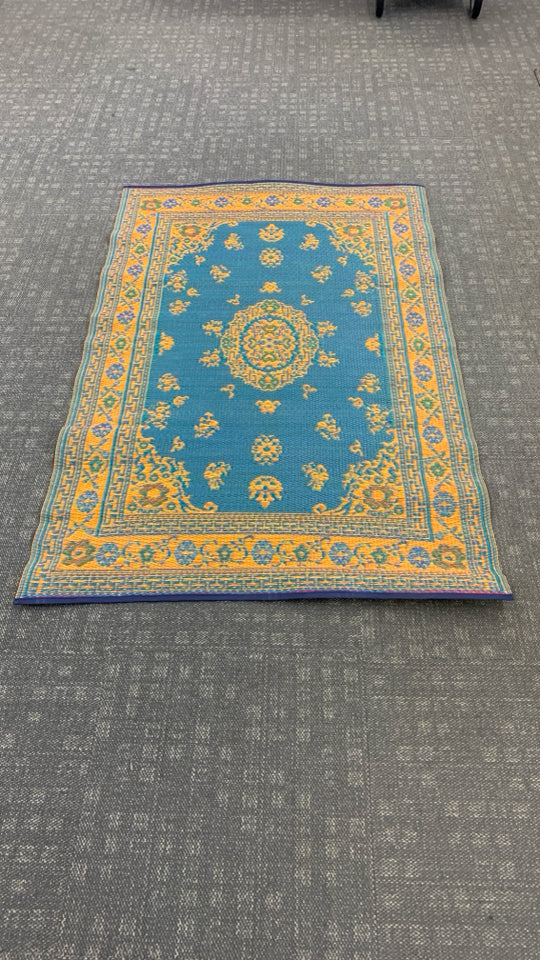 BLUE/ORANGE MAD MATS REVERSIBLE INDOOR OUTDOOR RUG.