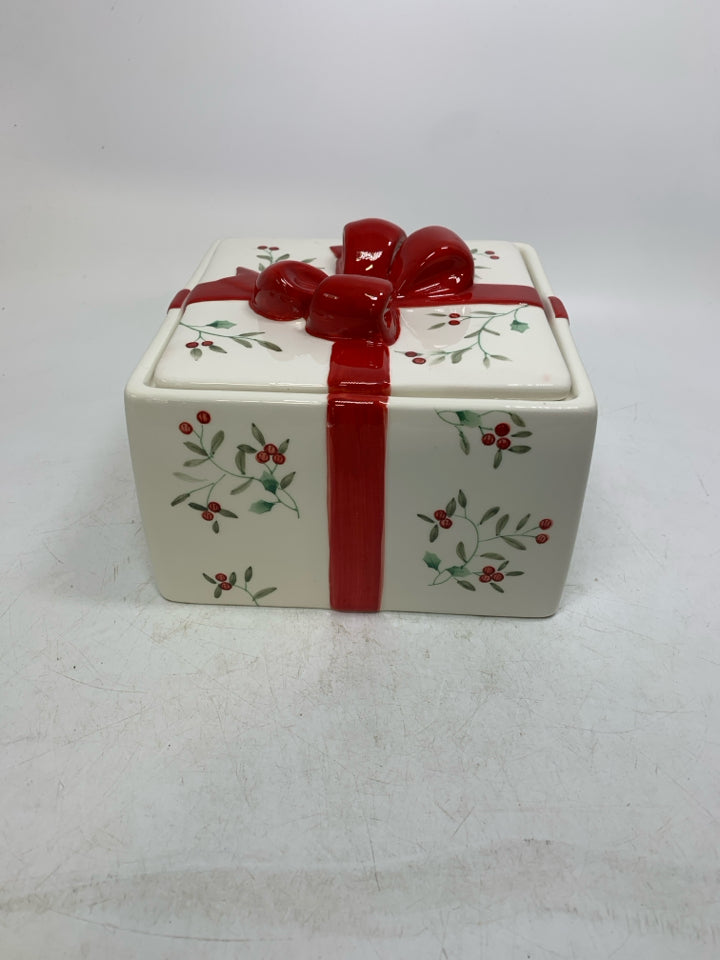 CERAMIC MISTLETOE PRESENT CANISTER W/ RED BOW.