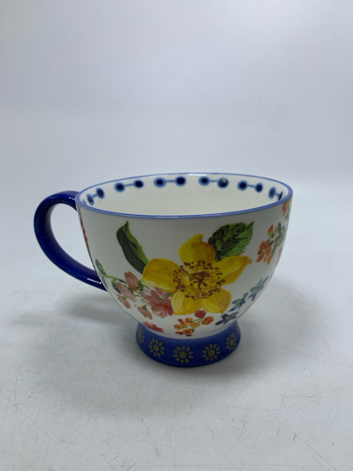FOOTED FLORAL MONOGRAM E MUG.