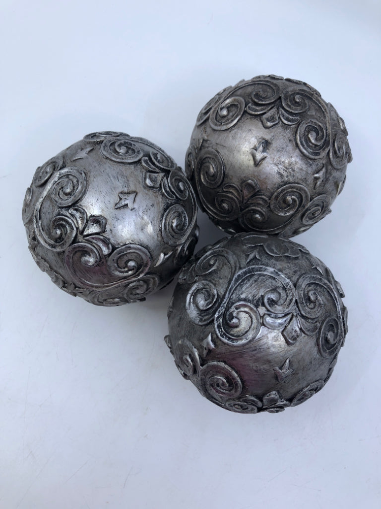 3 SILVER DECORATIVE BALLS.