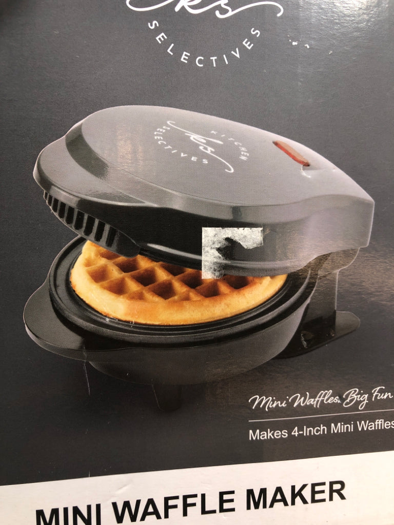 NIB MINI WAFFLE MAKER.