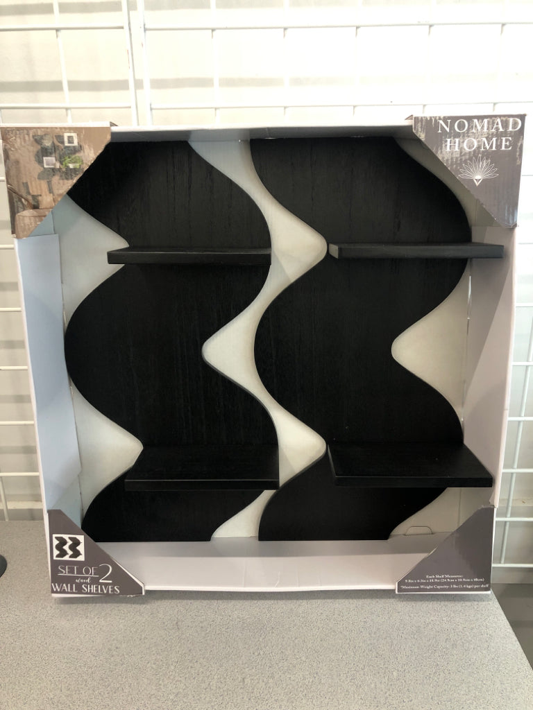NIB 2 WAVY WALL SHELVES.