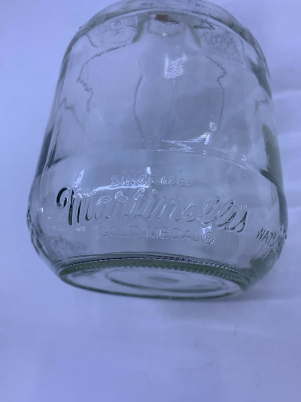 MARTINELLIS GLASS BOTTLE EMBOSSED LEAVES AND CORK TOP.