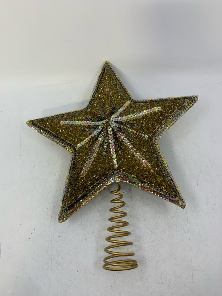 GOLD SEQUENCE STAR SHAPED TREE TOPPER.