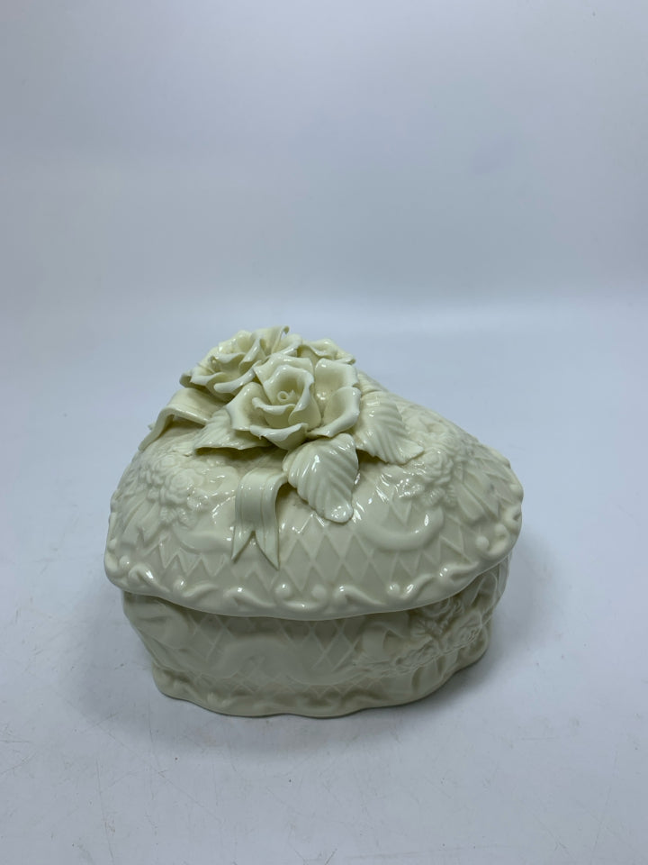 CERAMIC HEART SHAPED CANISTER W/ EMBOSSED ROSES & RIBBON.