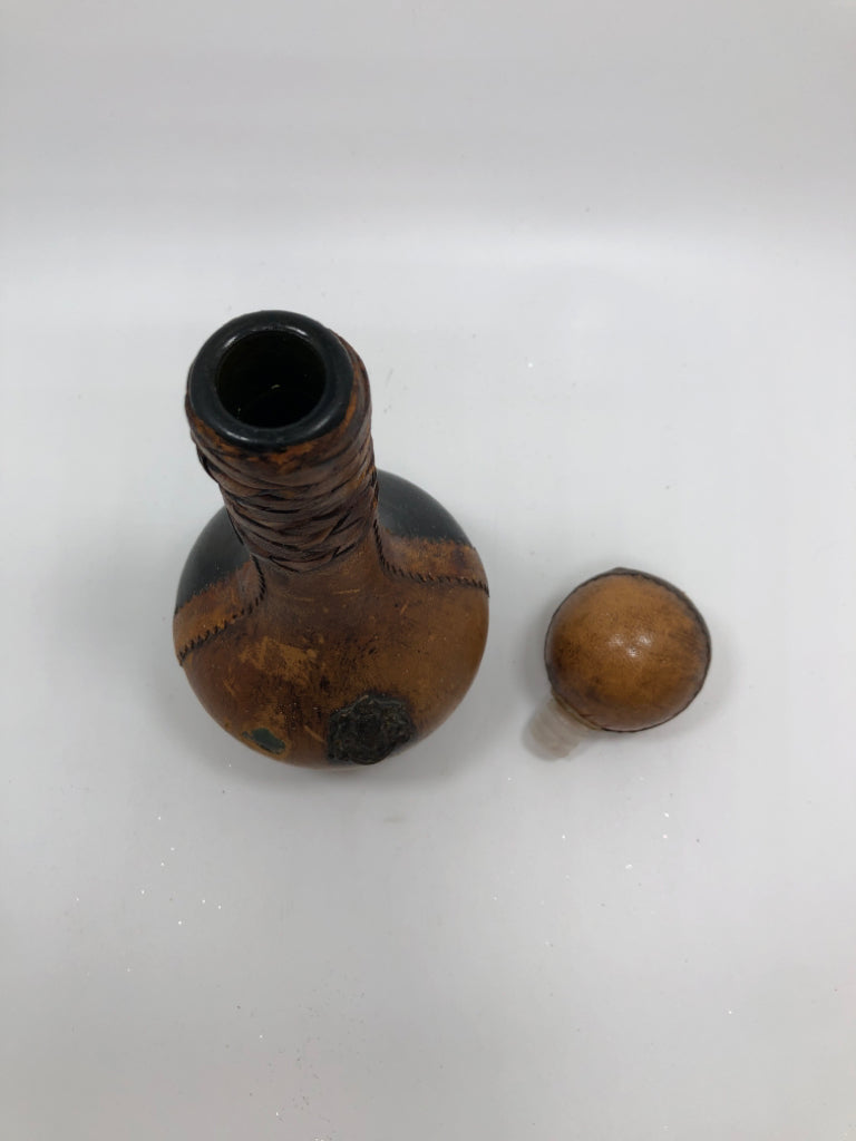 VTG LEATHER WRAPPED DECANTER W/BALL STOPPER.