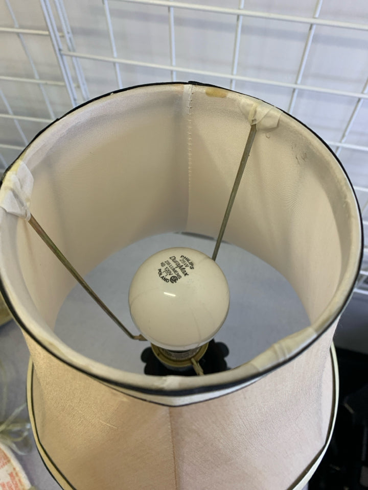 BLACK TABLE LAMP W/CREAM, BLACK STRIPE SHADE.