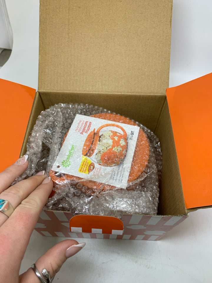 NIB ORANGE MICROWAVE POPCORN BOWL.