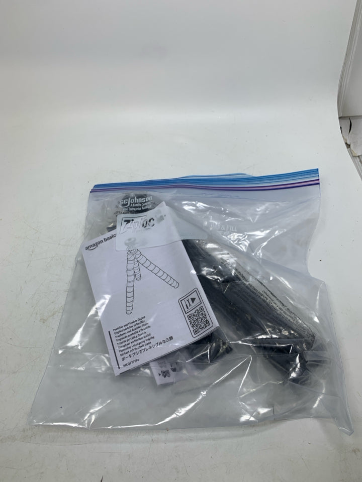 NEW AMAZON BASICS PORTABLE & FLEXIBLE TRIPOD IN BAG.