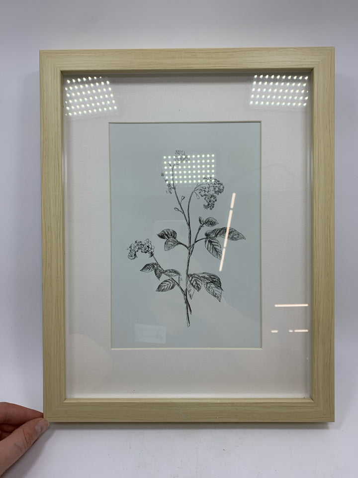 PALE BLUE FLORAL PRINT IN WOOD FRAME.