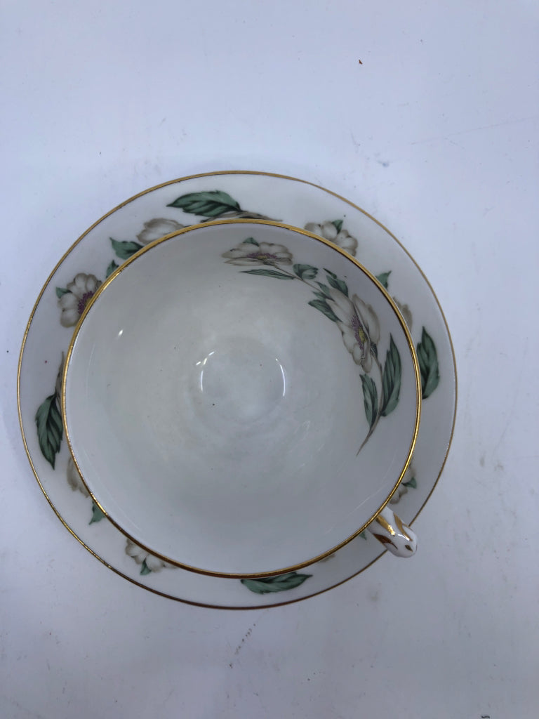VTG WHITE FLORAL TEACUP AND SAUCER.