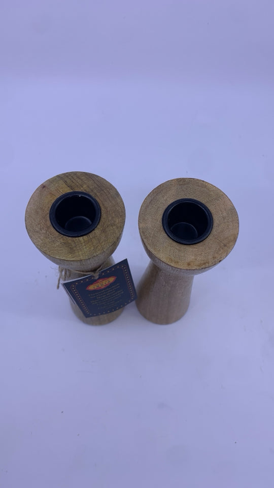 2 PIECE WOODEN CANDLE HOLDER.