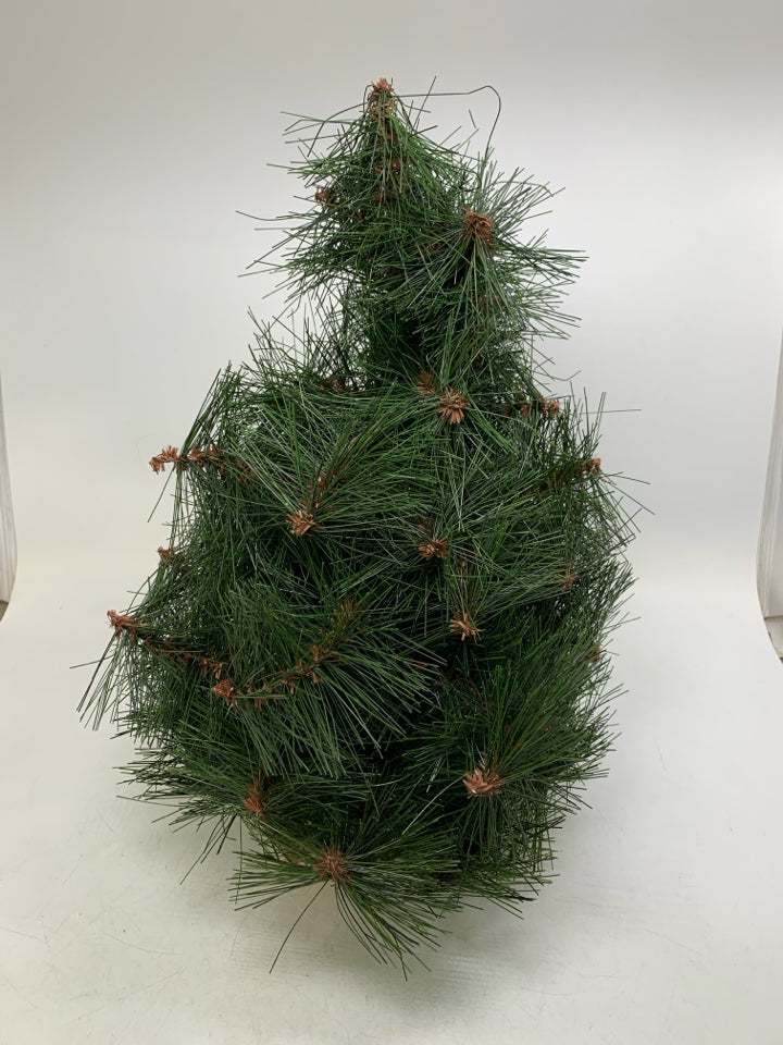 PINE TREE W/ BURLAP BASE.