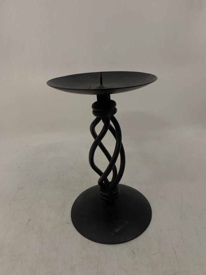BLACK SCROLL METAL PILLAR CANDLE HOLDER.