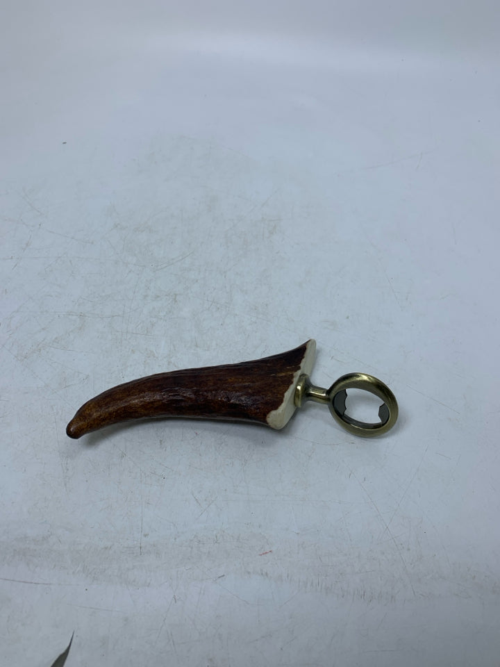 FAUX ANIMAL HORN/ANTLER BOTTLE OPENER.