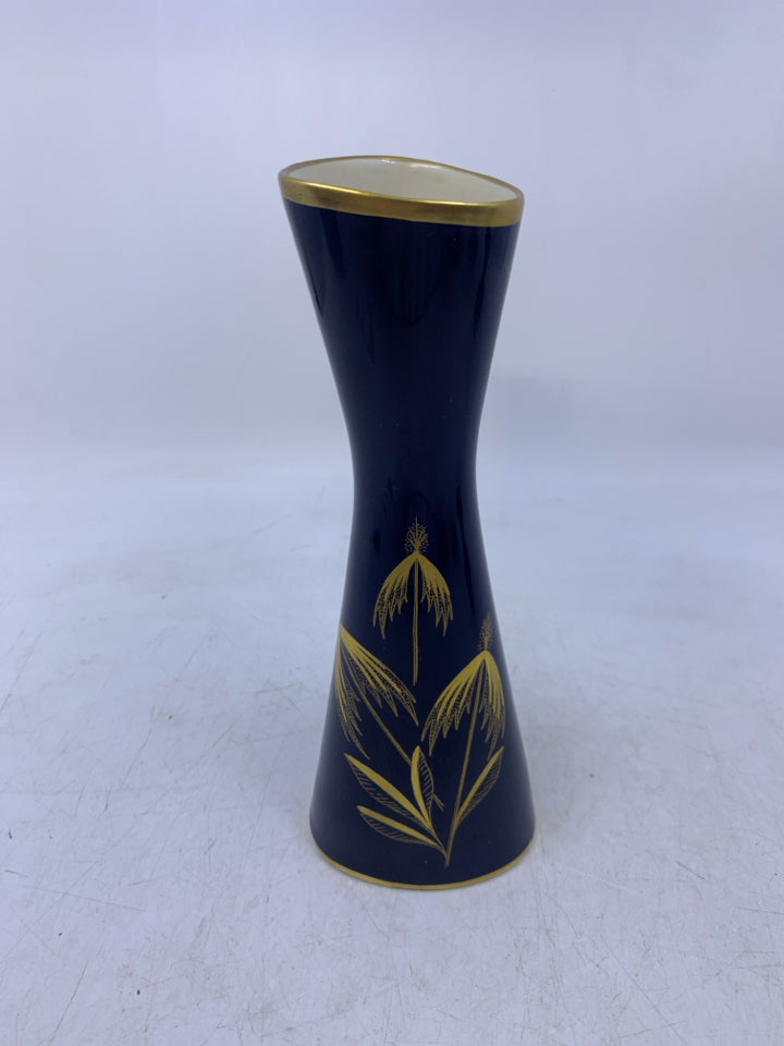 COBALT BLUE TRIANGLE SHAPED VASE W/ LEAF/STEMS FLOWERS.