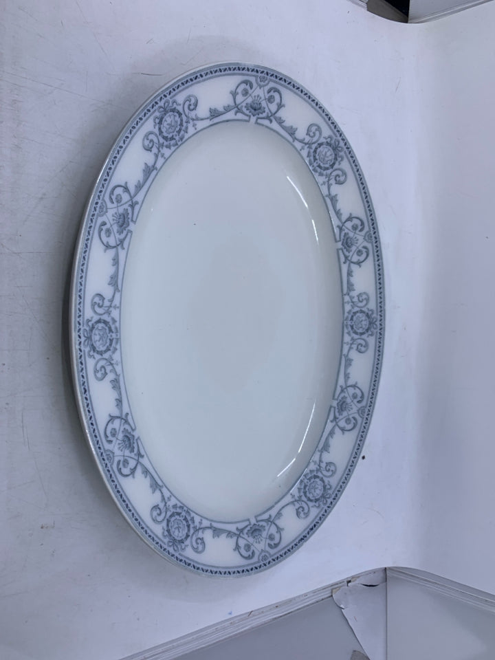 LARGE OVAL WHITE SERVING PLATTER W/ BLUE FLORAL & SCROLL EDGE.