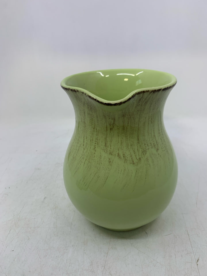 LIGHT GREEN DISTRESSED CERAMIC VASE.