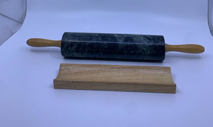 HEAVY BLACK MARBLE ROLLING PIN ON STAND.