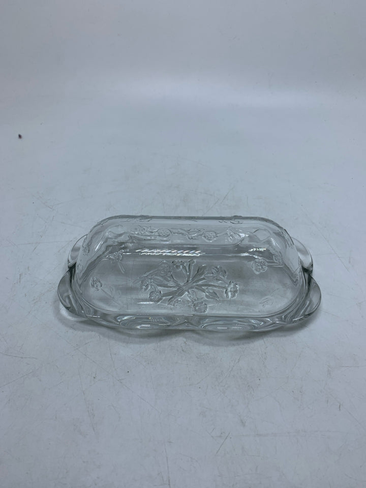 CLEAR GLASS COVERED BUTTER DISH W/ EMBOSSED FLOWERS.