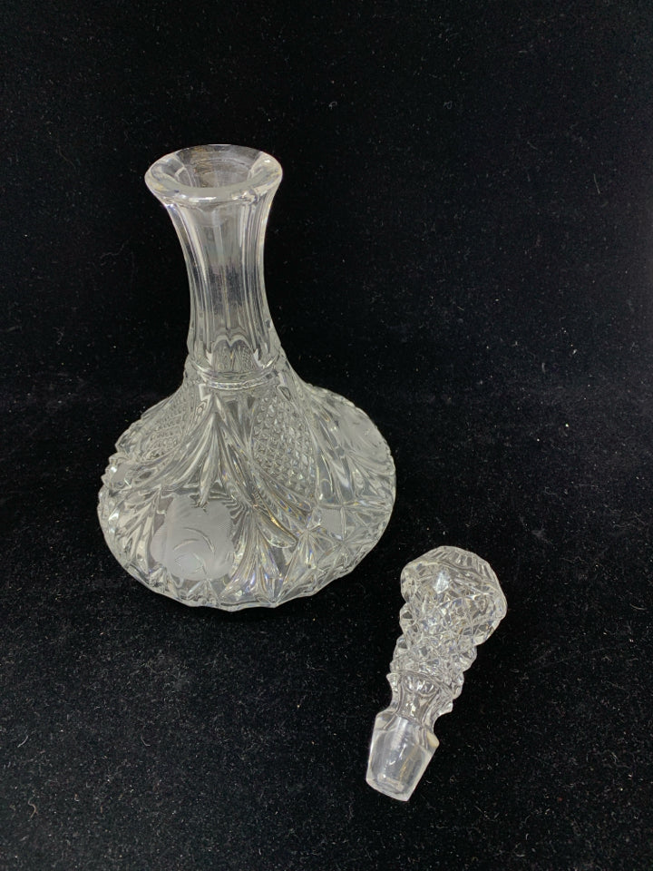 CUT GLASS EMBOSSED W/FLOWERS.