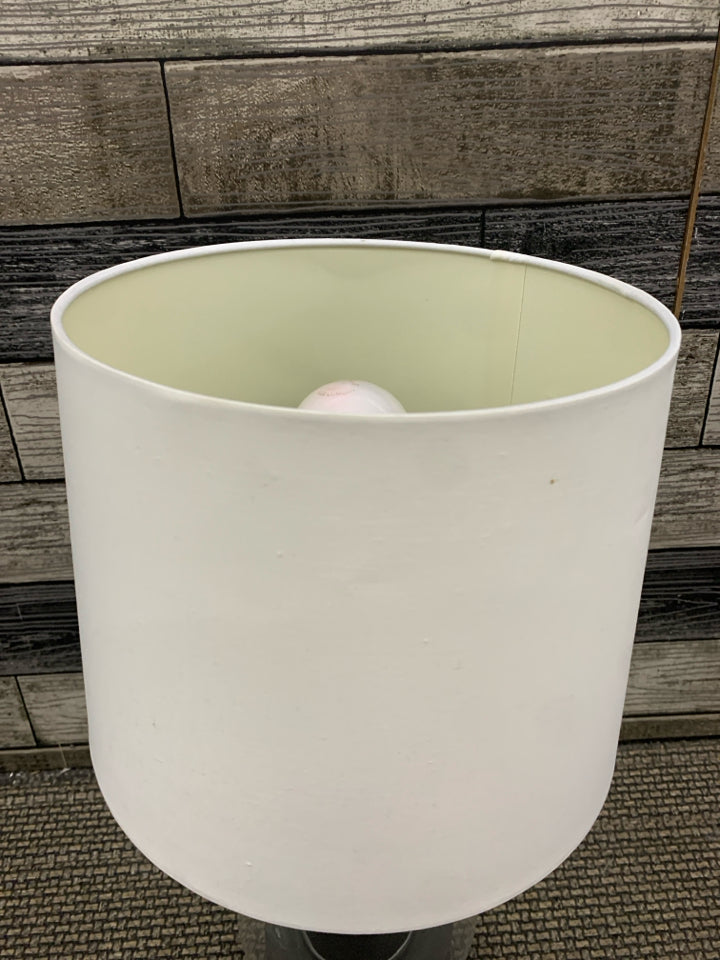 TRIANGLE SHAPED BASE LAMP W WHITE SHADE.