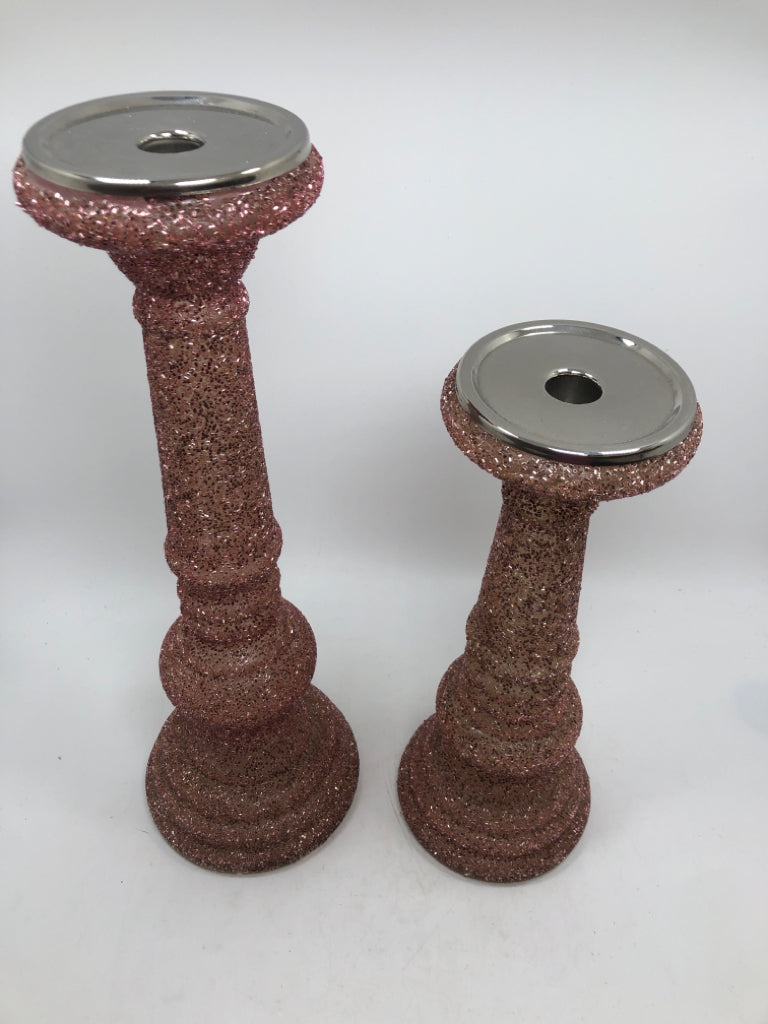 2 PINK GLITTER PILLAR CANDLE HOLDERS.