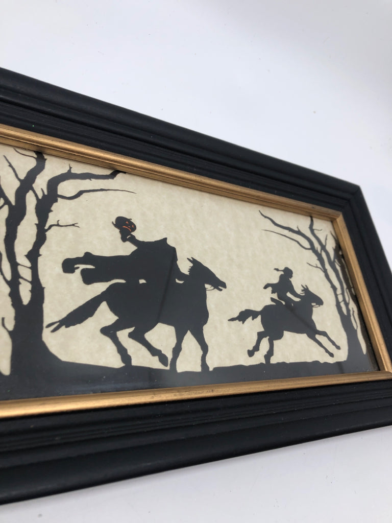 HALLOWEEN HEADLESS HORSEMAN SILHOUETTE IN BLACK FRAME.