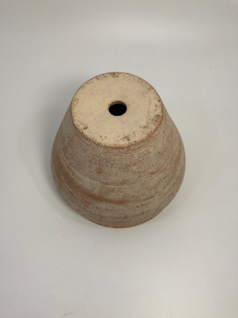 BEIGE DISTRESSED CERAMIC PLANTER.