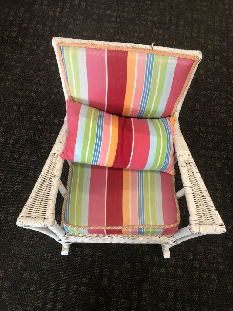VTG WHITE WICKER ROCKING CHAIR W/ COLORFUL UPHOLSTERED BACK/CUSHION.