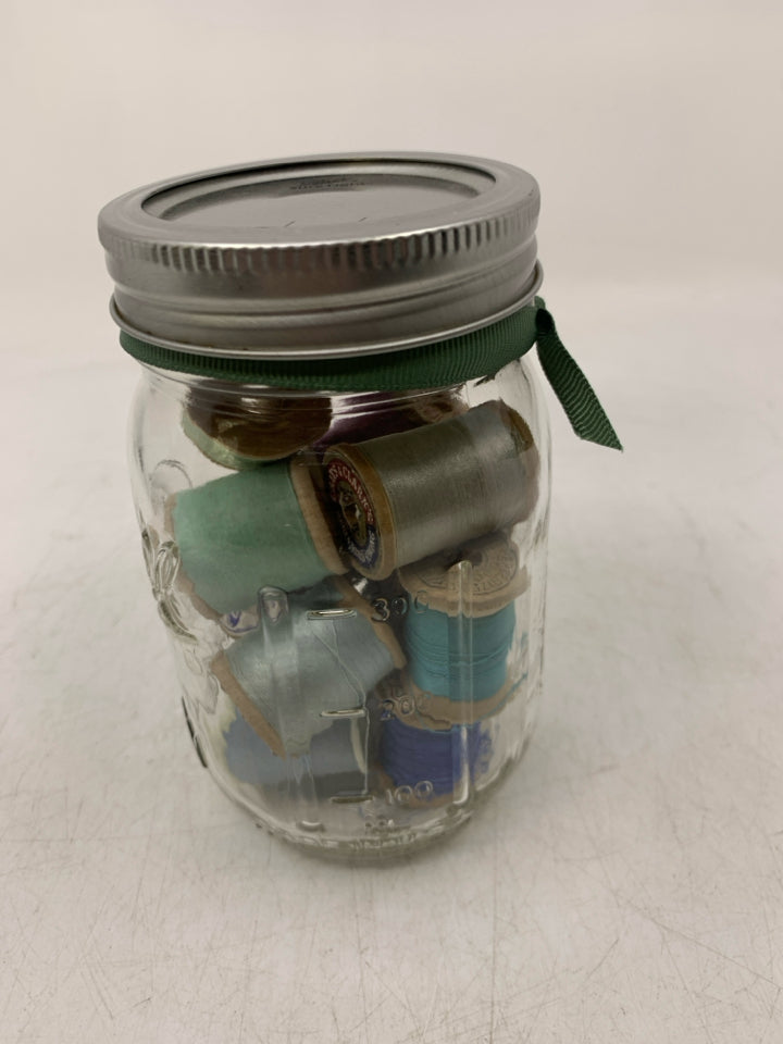 MASON JAR W/ ASSORTED THREAD.