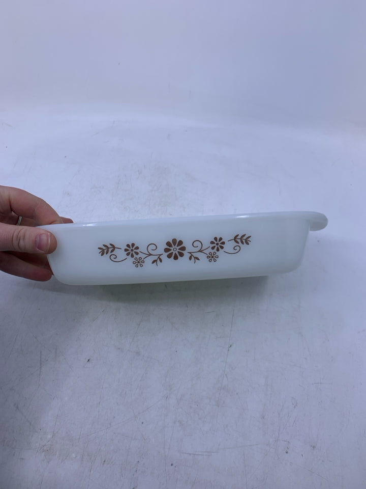 VTG WHITE GLASS LOAF PAN W/ BROWN FLOWERS.