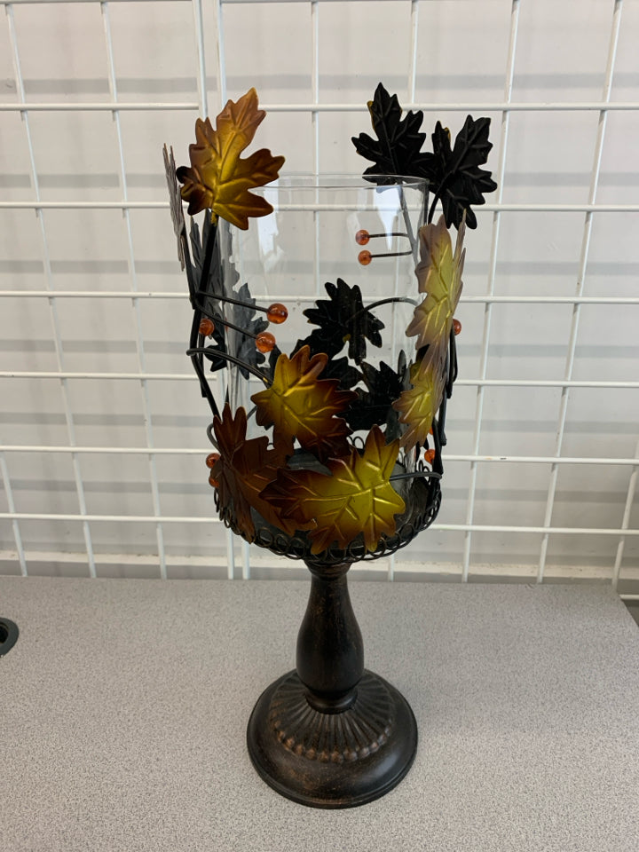 METAL LEAF PEDESTAL CANDLE HOLDER.