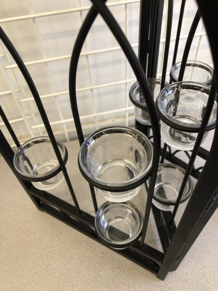 BLACK METAL FOLDING TEALIGHT HOLDER.