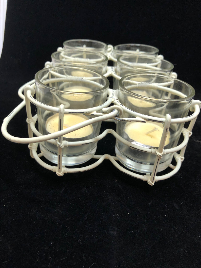 WHITE METAL VOTIVE HOLDER W/HANDLE.