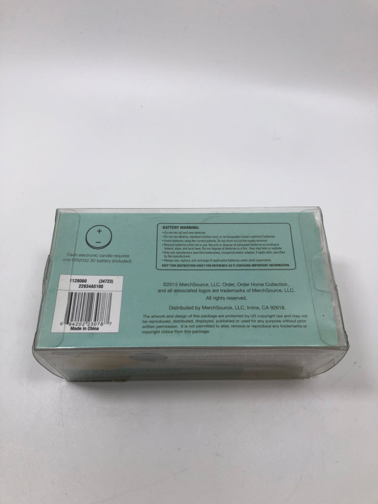 NIB 2PC LED BARREL CANDLE SET.