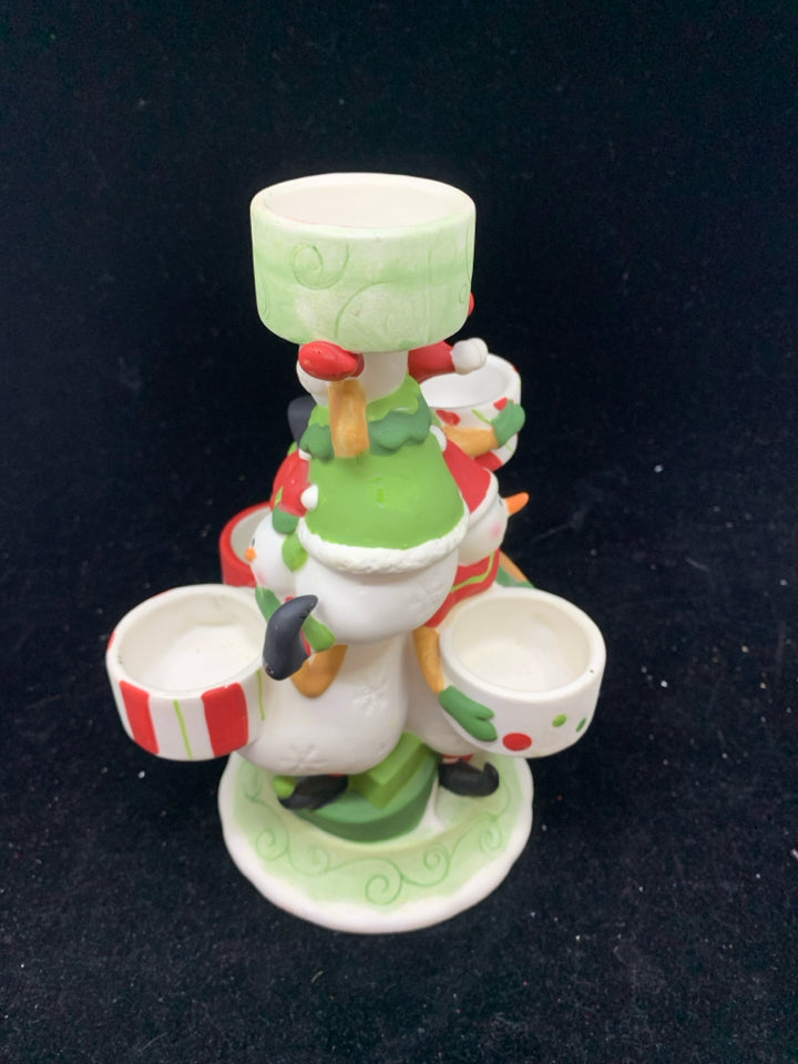 CERAMIC PILE OF SNOWMEN TEA LIGHT CANDLE HOLDER.