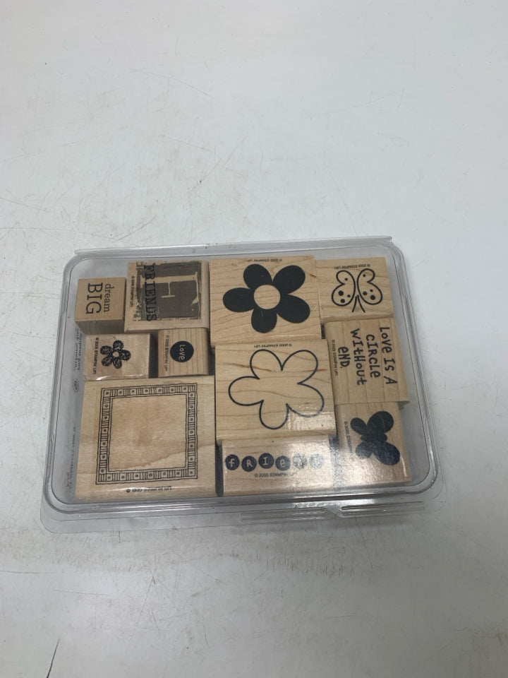 STAMPS IN CASE.