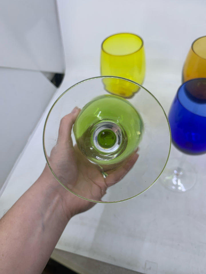 4 ASSORTED COLORED WINE GLASSES.