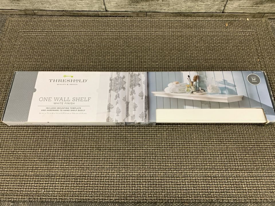NIB WHITE FLOATING WALL SHELF.