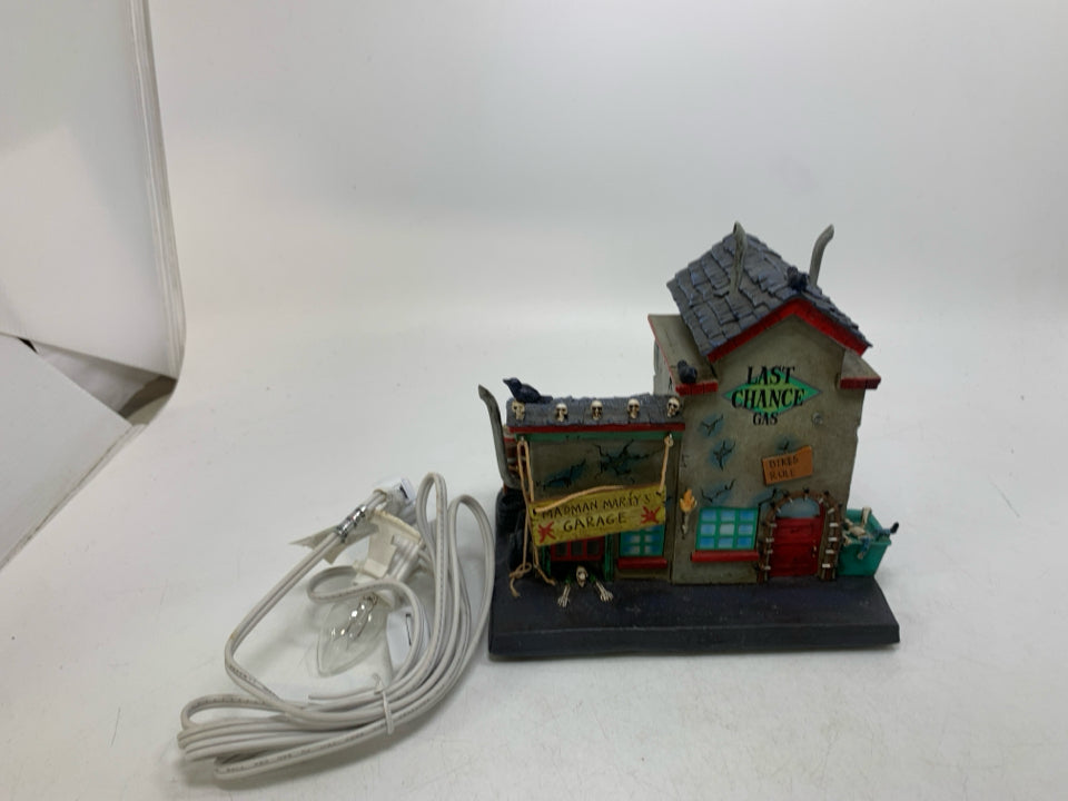 HAWTHORNE VILLAGE MADMAN MARTY'S GARAGE & GAS RETIRED #A1751