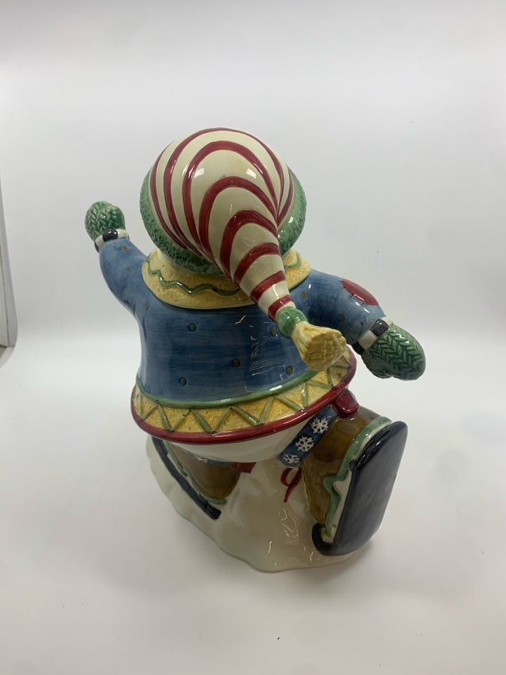 SKATING SNOWMAN COOKIE JAR.