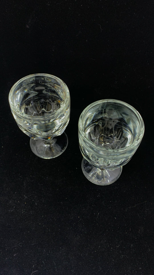2 HEAVY GLASS THUMBPRINT GOBLETS.