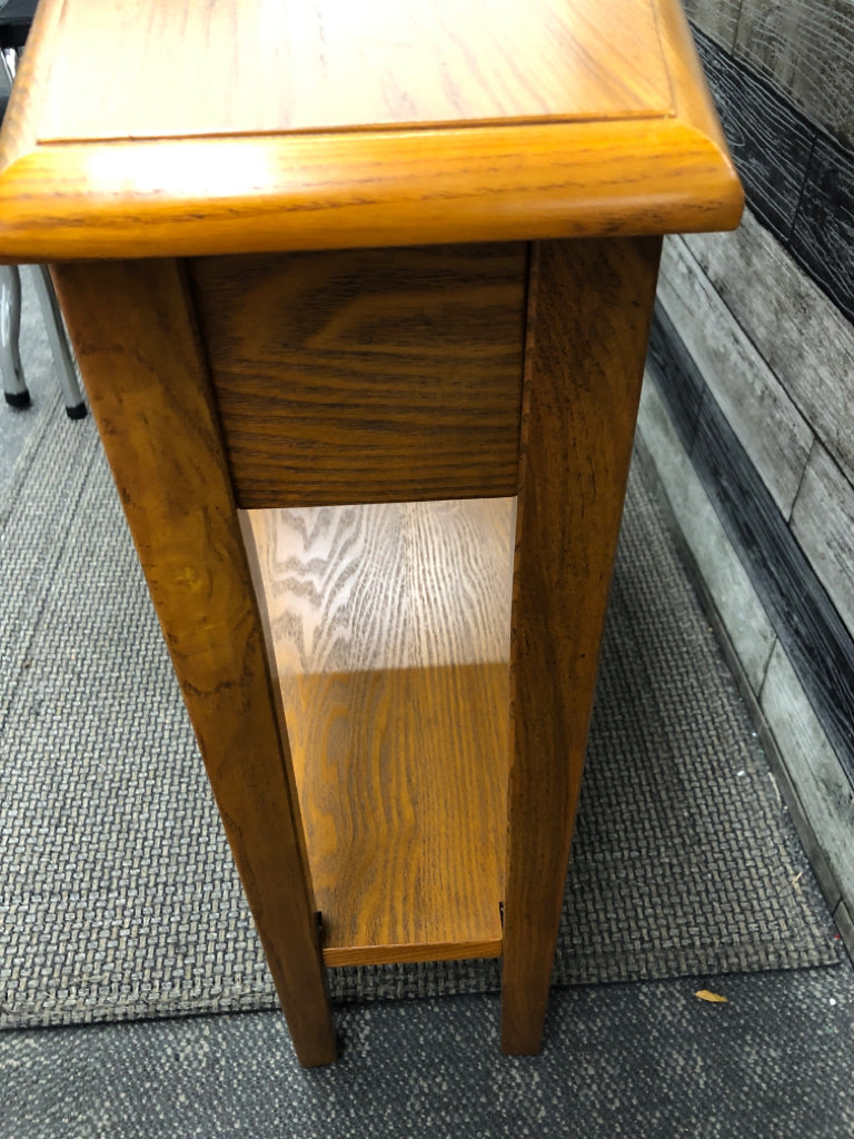 NARROW ANGLED WOOD END TABLE W/LOWER SHELF.