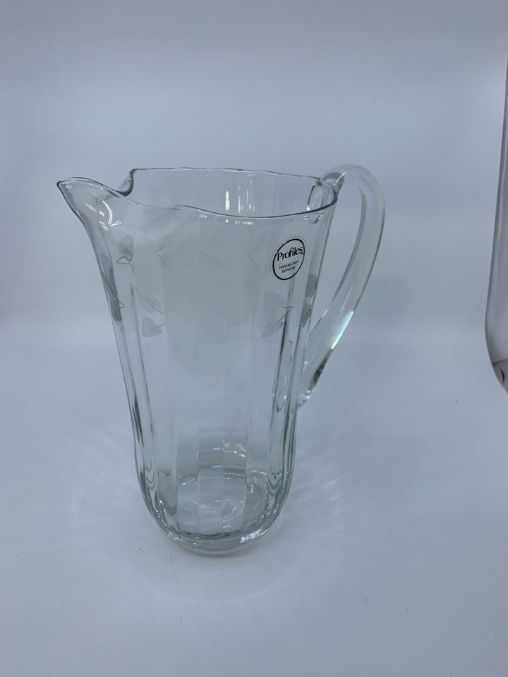 CLEAR RIBBED GLASS PITCHER W/ ICELIP & LEAF ETCHING.