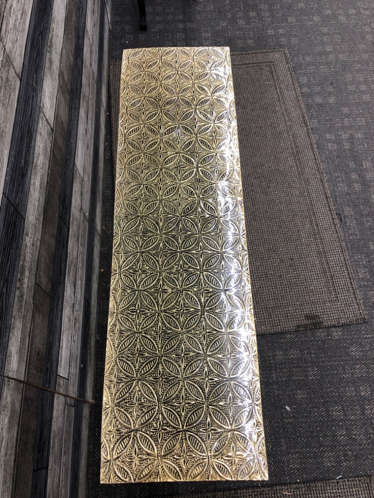 NARROW TABLE W/ GOLD ETCHED CERAMIC TOP & METAL SIDES.