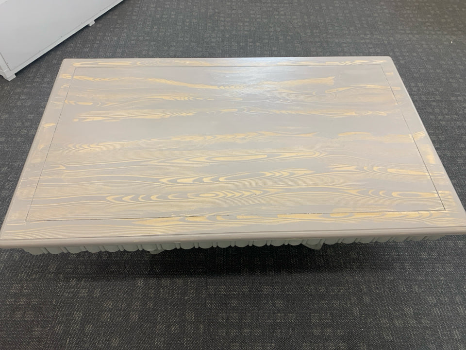 GREY WASHED COFFEE TABLE ON PEDESTAL BASE.